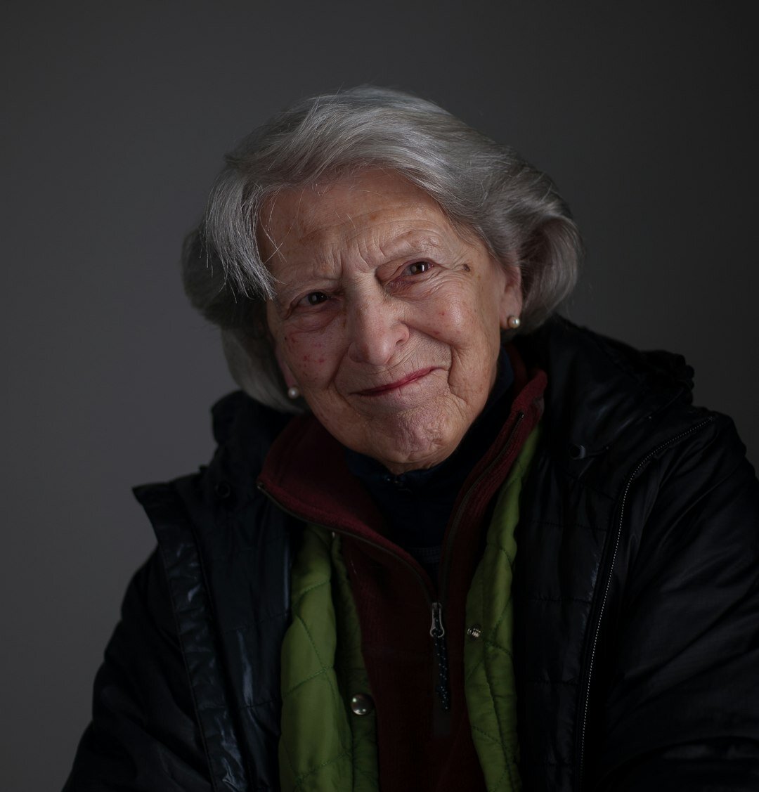 Portrait of a Slovak senior woman, club director, smiling warmly