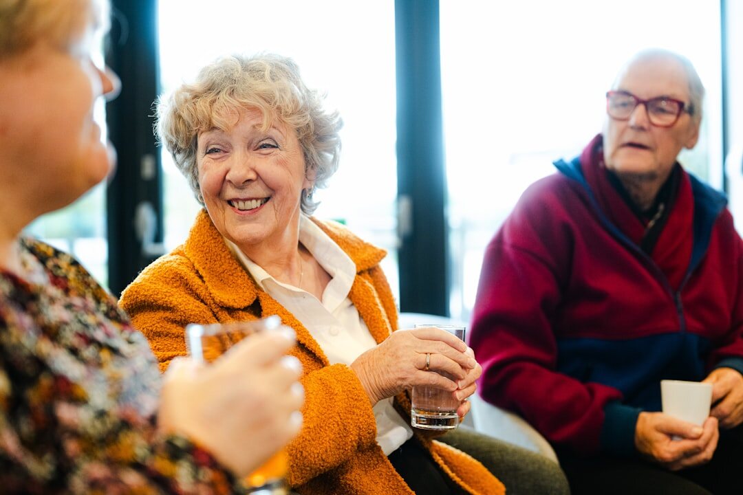 group of happy seniors talking